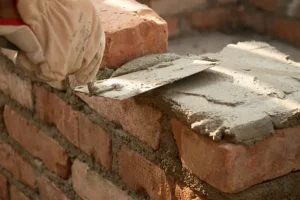 Gora Bricklayers showcasing Beam and Block Floor Insulation layers for energy-efficient flooring and underfloor heating.